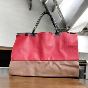 "FIREWOOD CARRIER" ~ Red & Tan Leather by Wanita Stanley