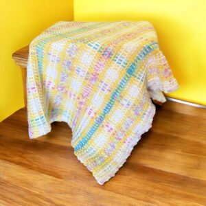 Crocheted Baby Blanket in White Yellow Pink & Blue