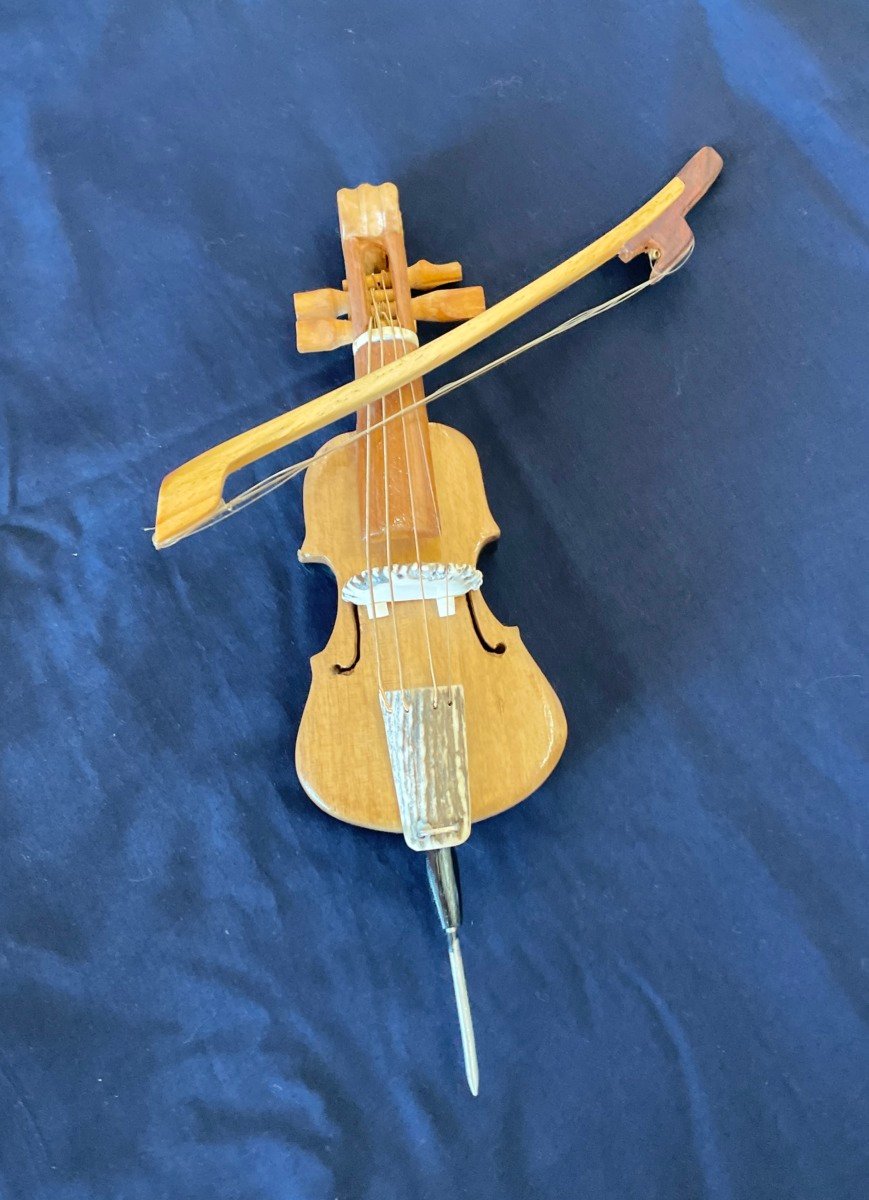 Hand Carved Cello and Bow on a Stand