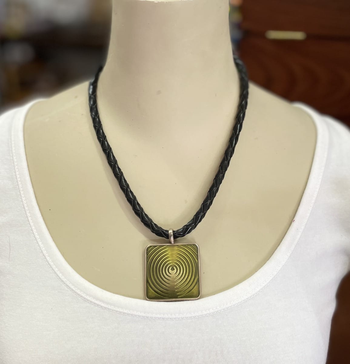 "PLAITED LEATHER NECKLACE" ~ in Black with Olive Green Enamel Pendant by Wanita Stanley