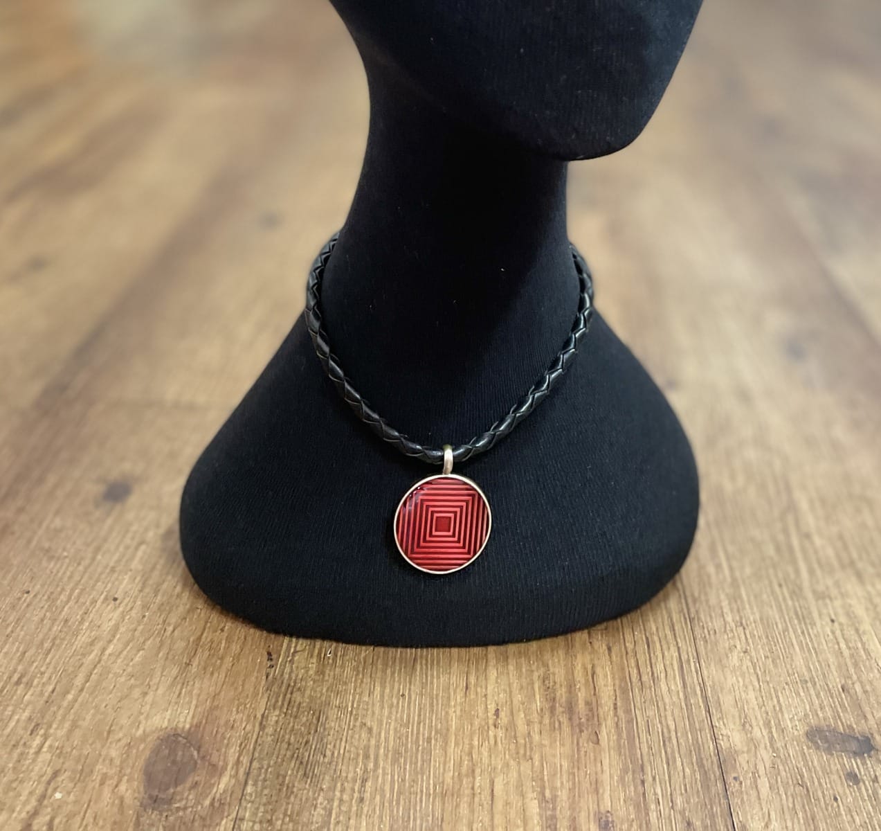 "PLAITED LEATHER NECKLACE" ~ in Black with Red Enamel Pendant by Wanita Stanley
