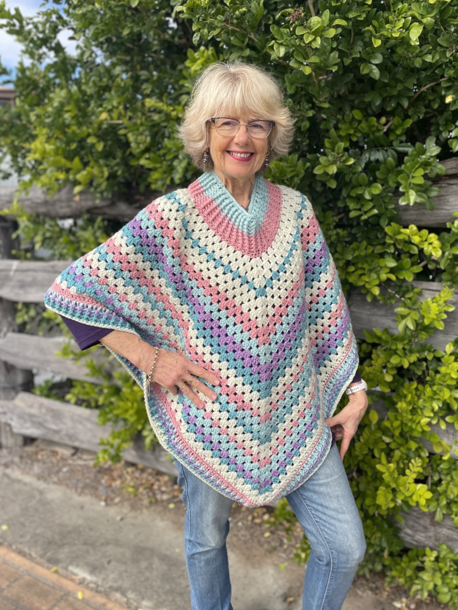 Hand Crocheted Poncho Pink Greens Purple & Cream - Image 2